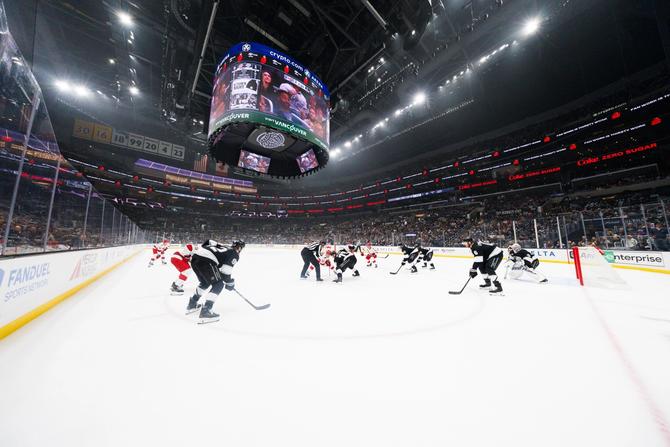 Hockey players setting up on the ice