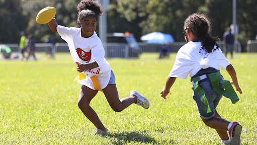 Everyone is playing (and paying) women’s flag football