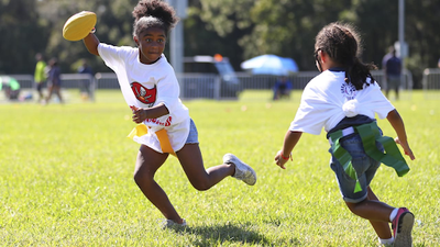 Everyone is playing (and paying) women’s flag football