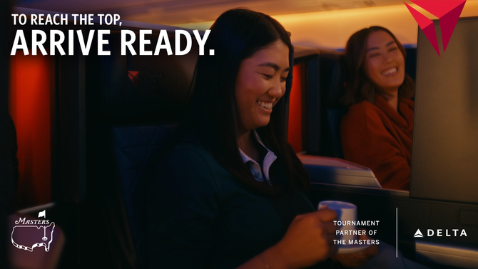 Two women smiling on their Delta flight