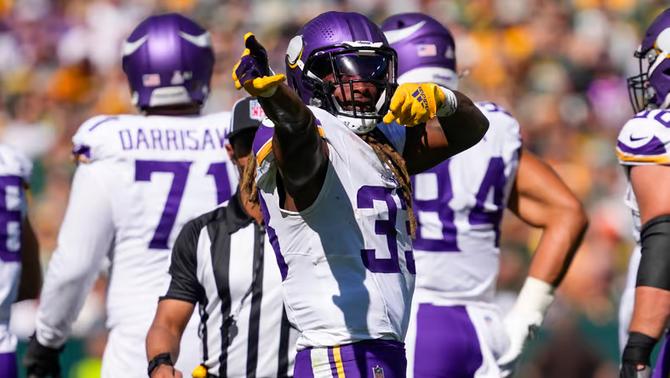 Minnesota Vikings running back Aaron Jones celebrates.