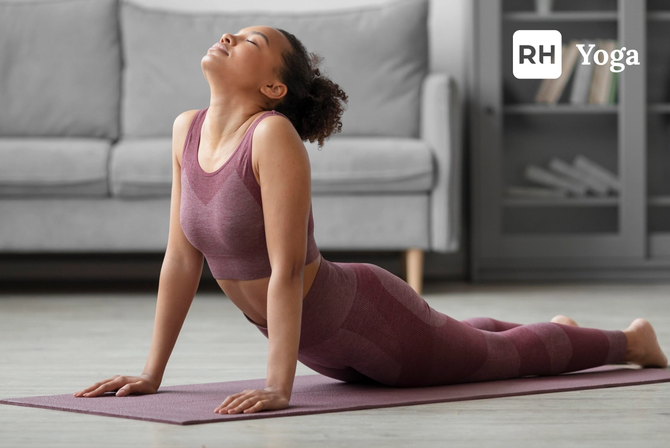 A woman doing yoga on a mat