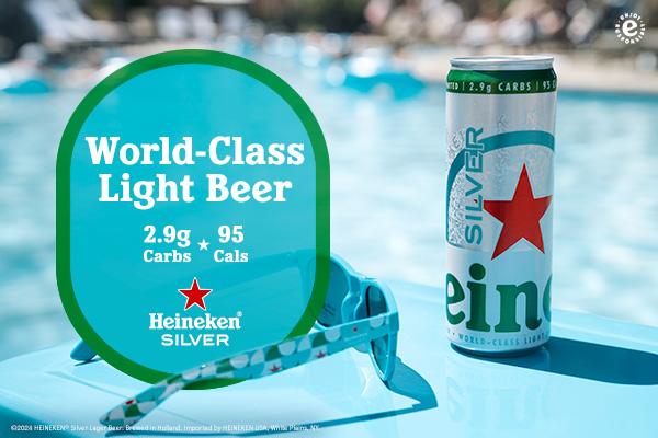 A can of Heineken Silver beside the pool