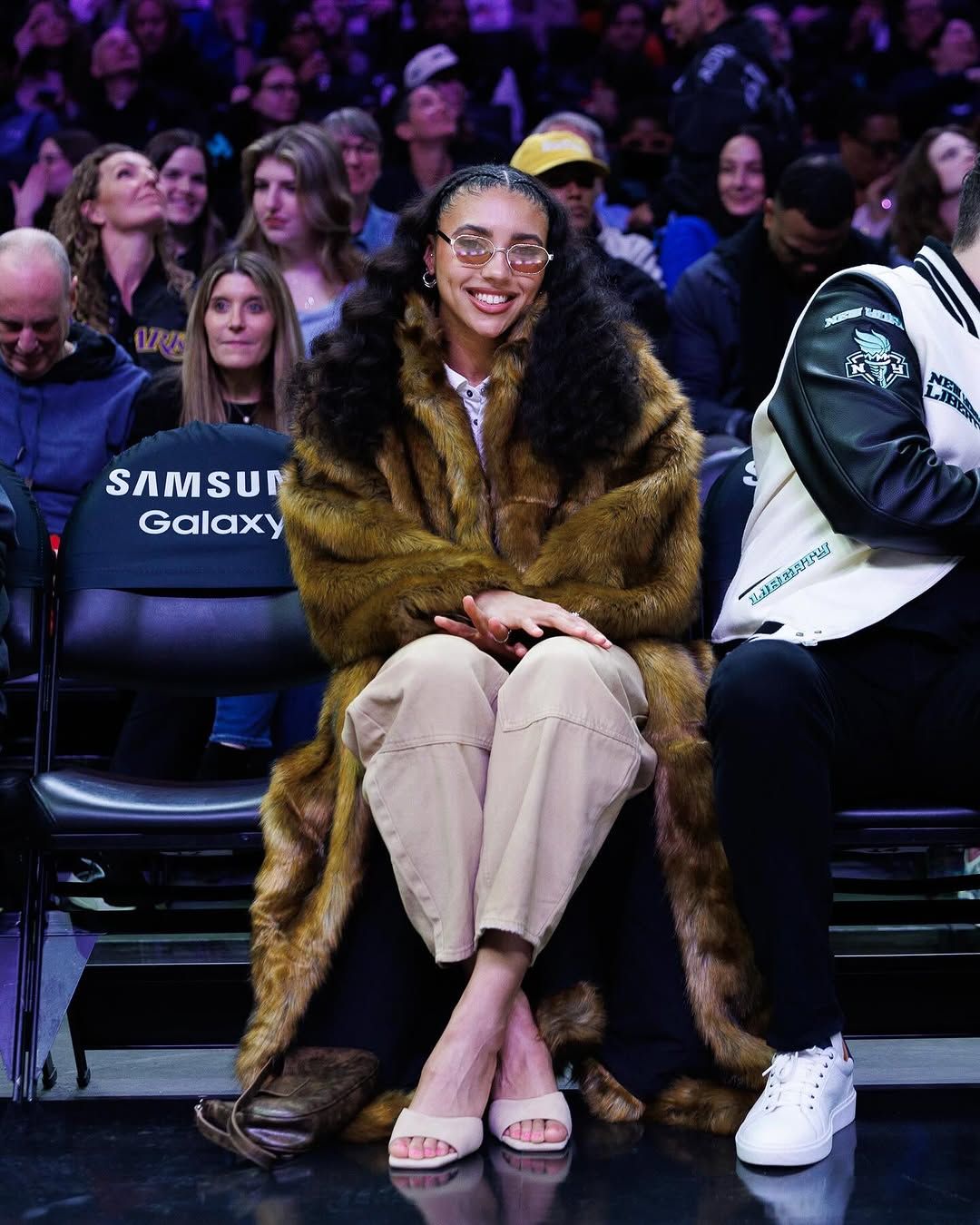 Azzi Fudd on the sidelines at an Unrivaled game.