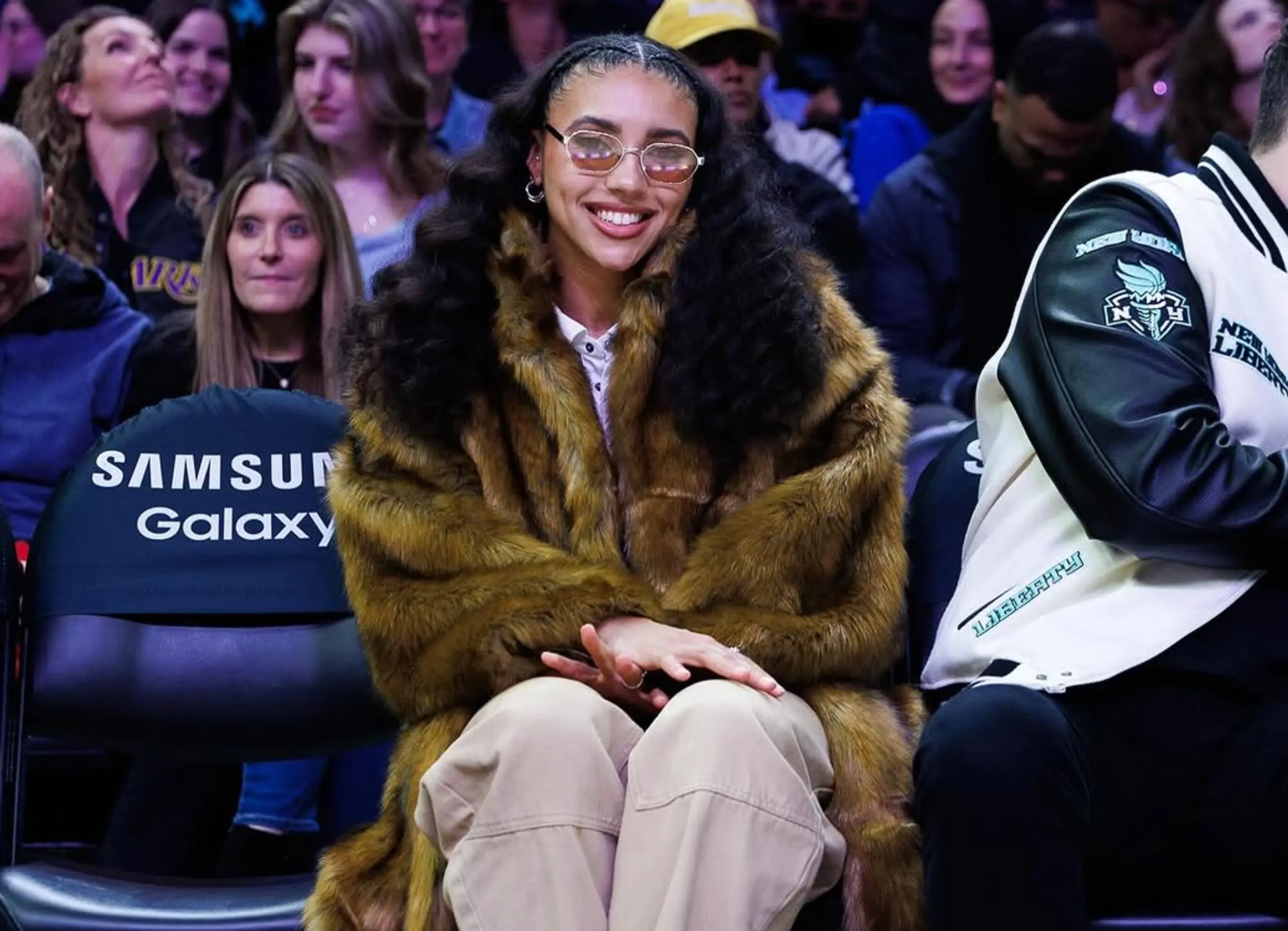 Azzi Fudd on the sidelines at an Unrivaled game.