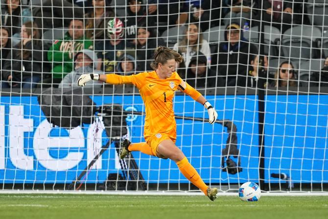USWNT goalkeeper Alyssa Naeher sends the ball upfield.