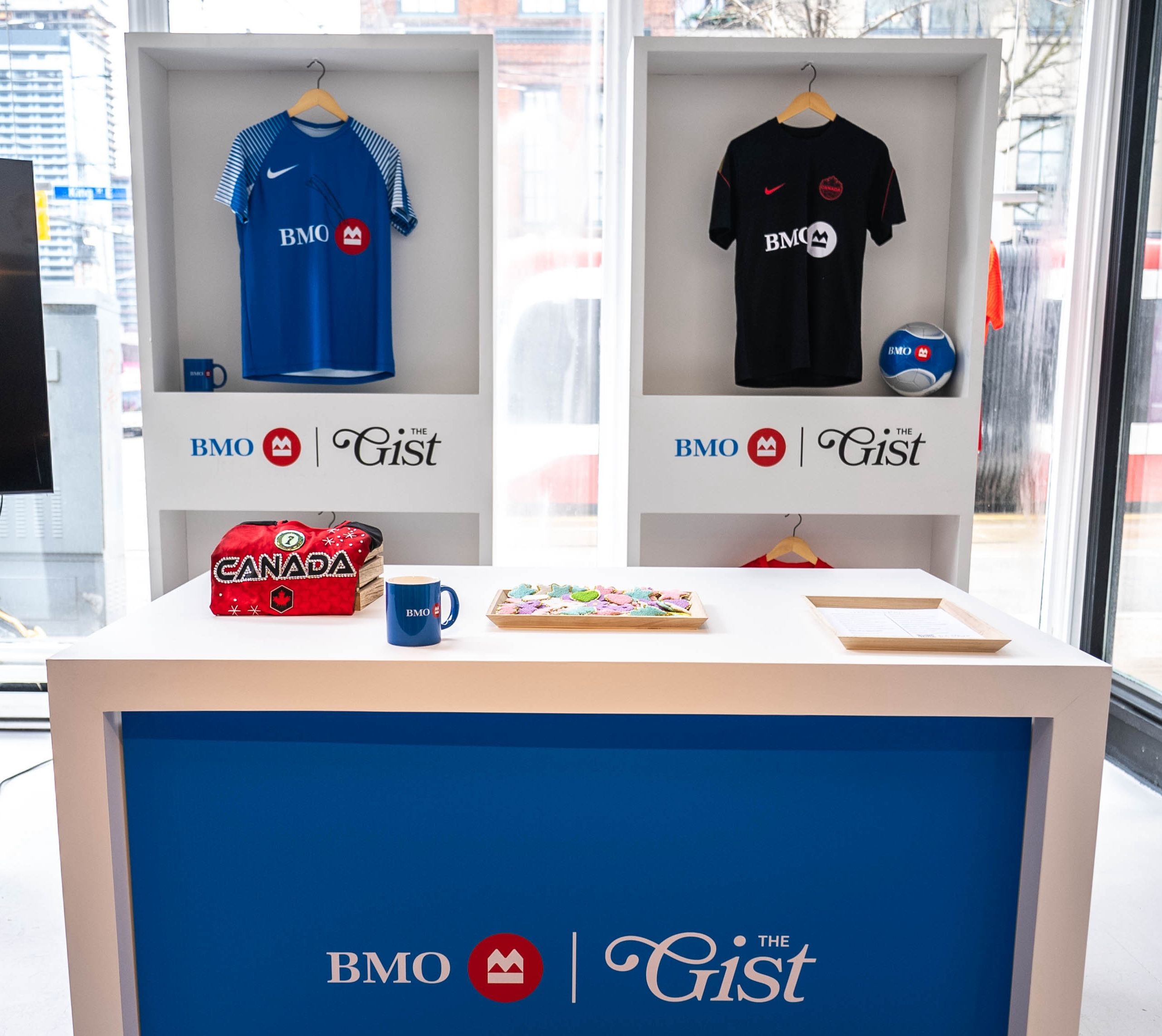 A Canada soccer jersey is being bedazzled with rhinestones