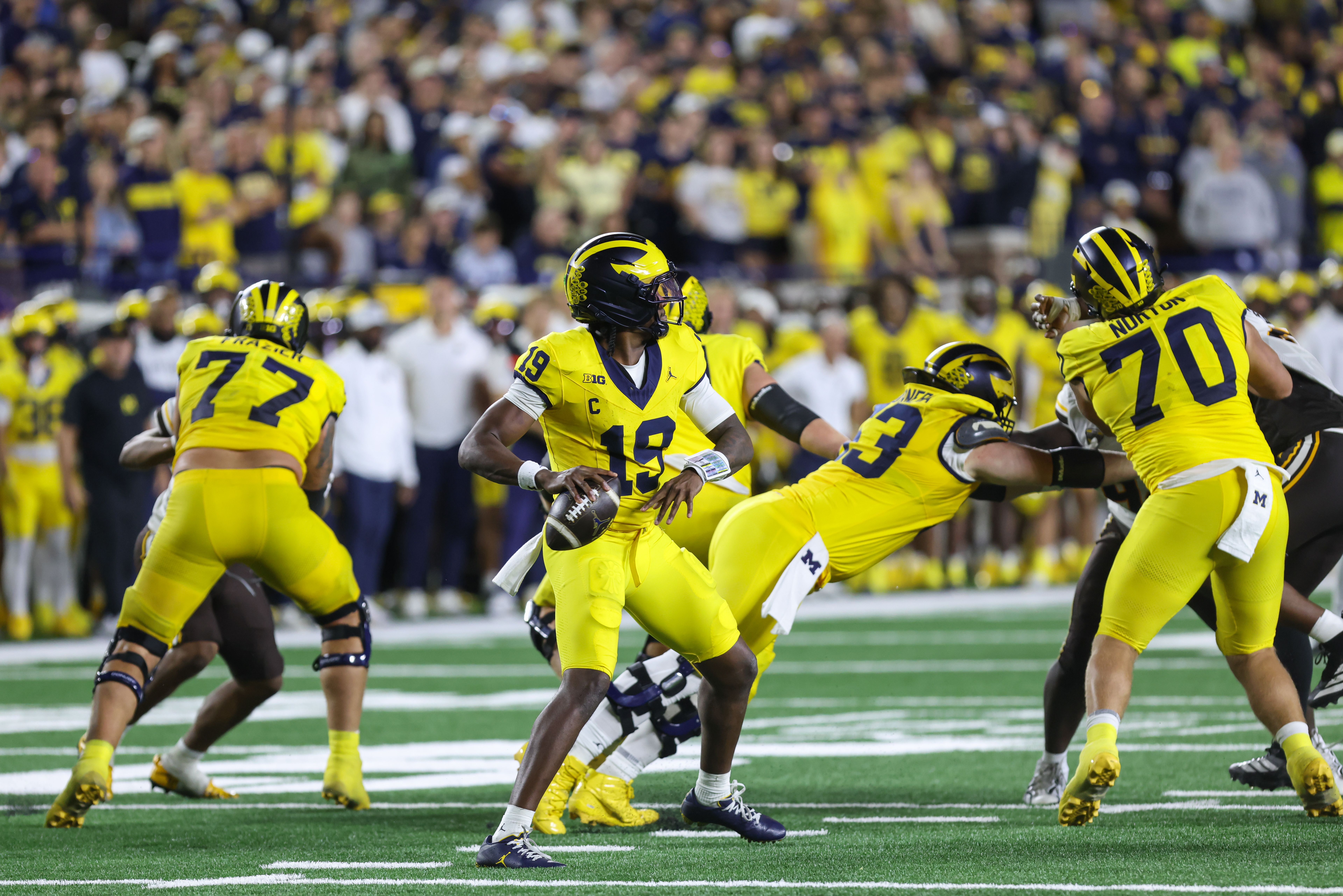 NCAA football headlines from a raucous Week 1