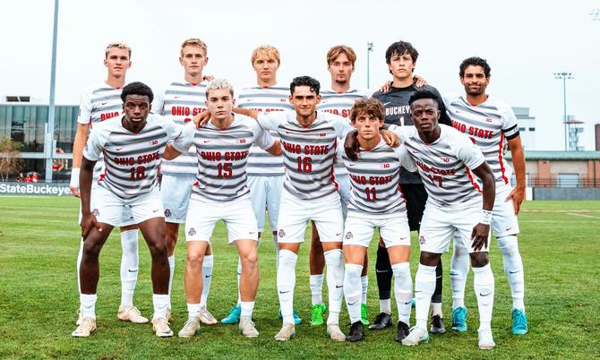 The Ohio State men’s soccer starting eleven pose for a photo.