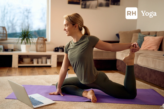 A woman doing yoga on a mat