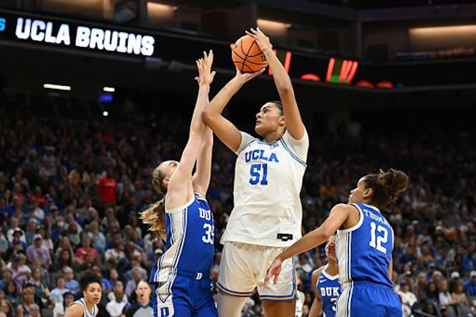 UCLA senior Lauren Betts shoots the ball over Duke sophomore Toby Fournier