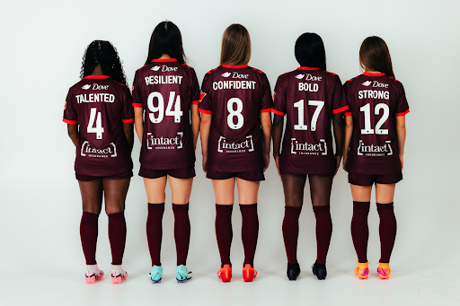 AFC Toronto players pose in special-edition jerseys created through Dove’s #ChangeTheCompliment campaign.