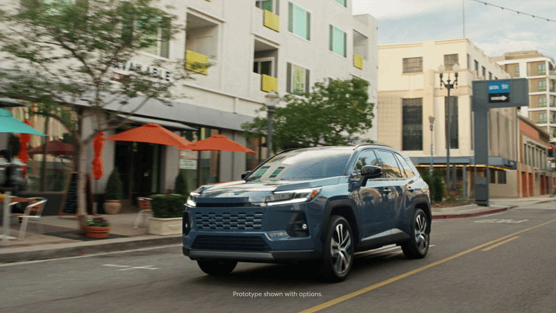RAV4 driving through ubran area, text reads, "What's your RAV4?"