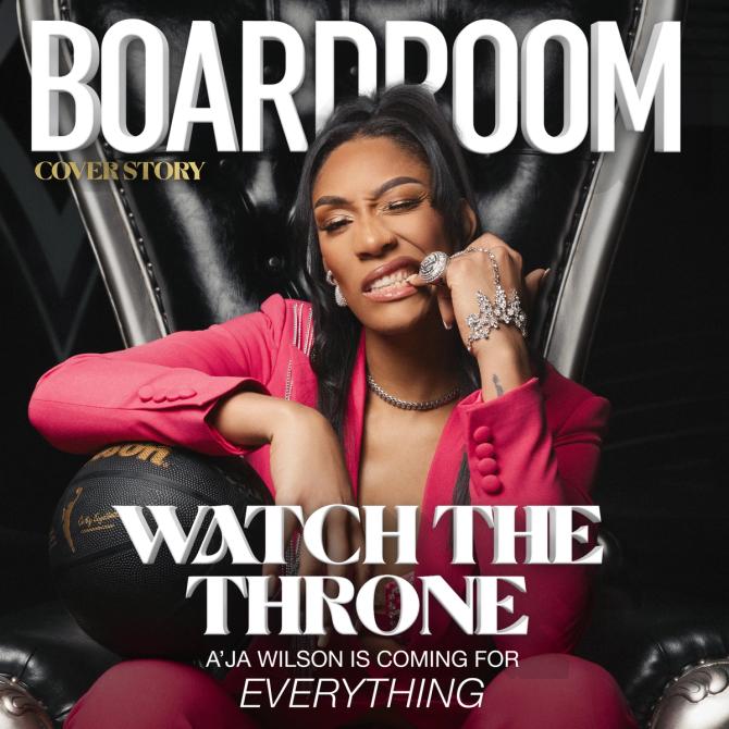 A'ja Wilson posing with a basketball and her jewelry
