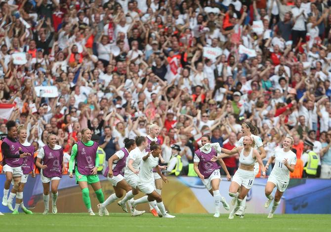 England's Chloe Kelly celebrates scoring her side's second and winning goal during the UEFA Women's Euro England 2022.