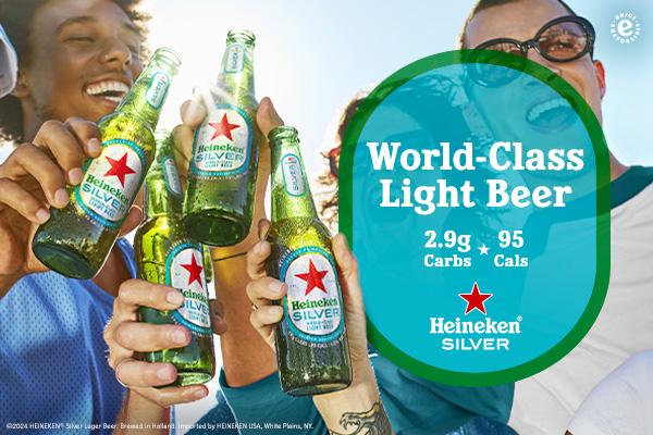 A group of people drinking Heineken Silver