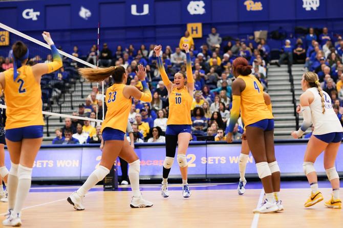Pitt women’s volleyball team celebrates a point.