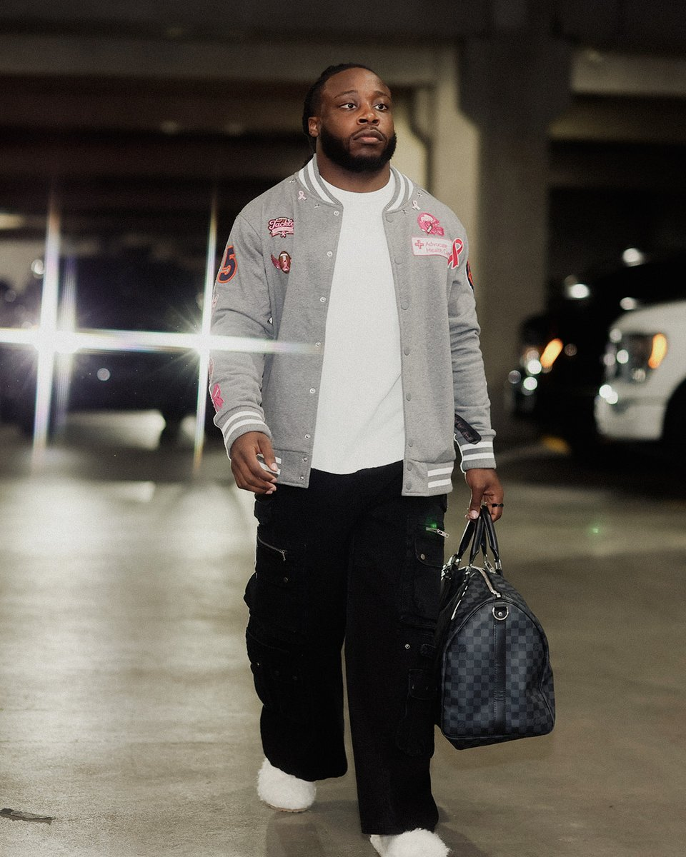 Chicago Bears running back Kyle Monangai wearing his custom jacket from Brenda.
