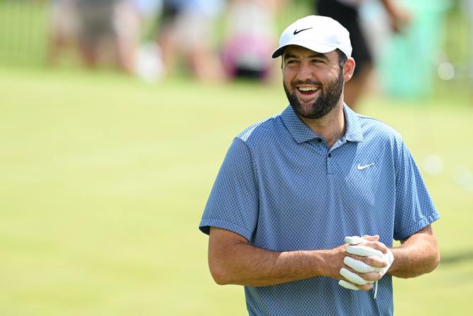 Scottie Scheffler of the United States smiles on the practice putting green during a practice round prior to the 2024 PGA Championship at Valhalla Golf Club.
