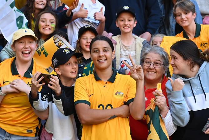 Sam Kerr of Australia poses for a photo with fans after the International Women's Friendly match between the Australia Matildas and Canada at Suncorp Stadium on September 03, 2022 in Brisbane, Australia.