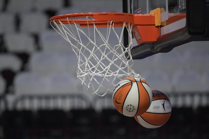 A general view of two basketballs after going through the net during shootaround.