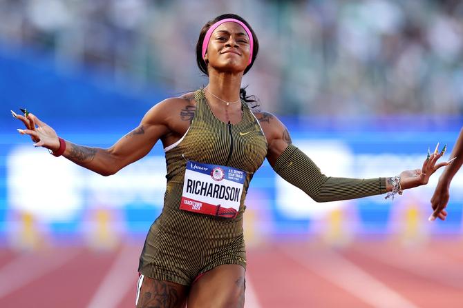 ShaCarri Richardson celebrating on the track