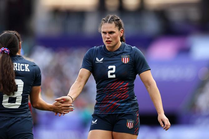 Ilona Maher of Team United States celebrates with teammate Alex Sedrick during the Women’s Pool C match between United States and Japan on day two of the Olympic Games Paris 2024.