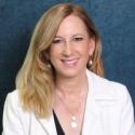 A portrait of WNBA commissioner Cathy Engelbert.