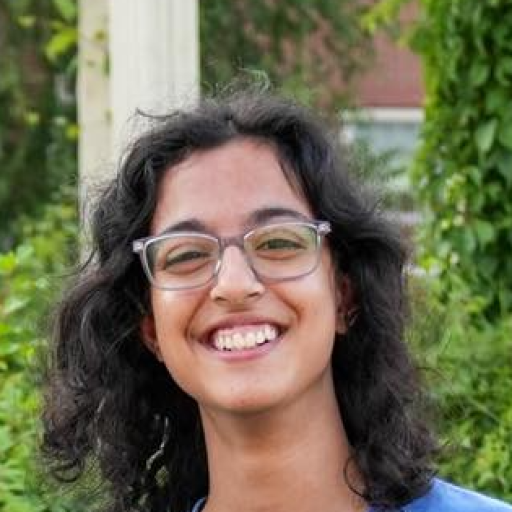 Elisha Gunaratnam (She/her)