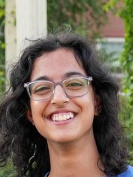 Elisha Gunaratnam (She/her)