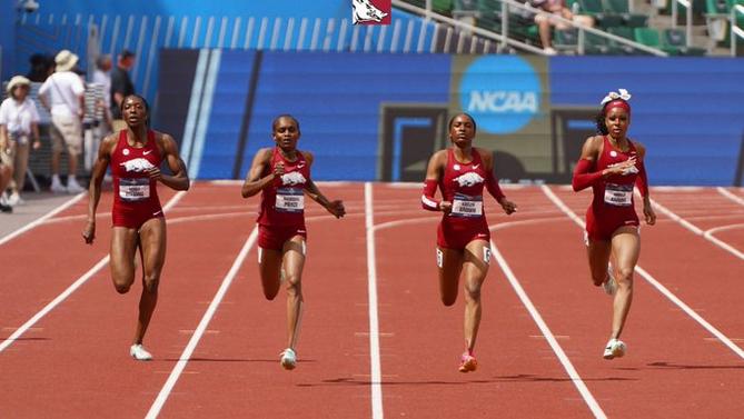 Members of the No. 1 Arkansas women’s track & field team sweep the 400m.