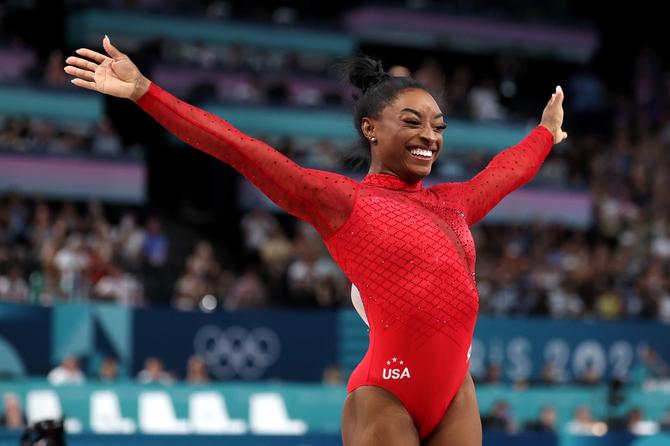 Simone Biles of Team United States celebrates after finishing her routine during the Artistic Gymnastics Women's Vault Final on day eight of the Olympic Games Paris 2024 at Bercy Arena on August 03, 2024 in Paris, France.