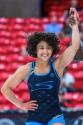 Wrestler Audrey Jimenez celebrates after a win.