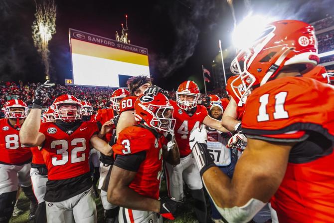 Georgia celebrates after an eight overtime win against rival Georgia Tech
