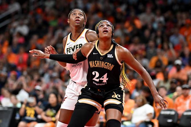 Aliyah Boston #7 of the Indiana Fever boxes out against Aaliyah Edwards #24 of the Washington Mystics.