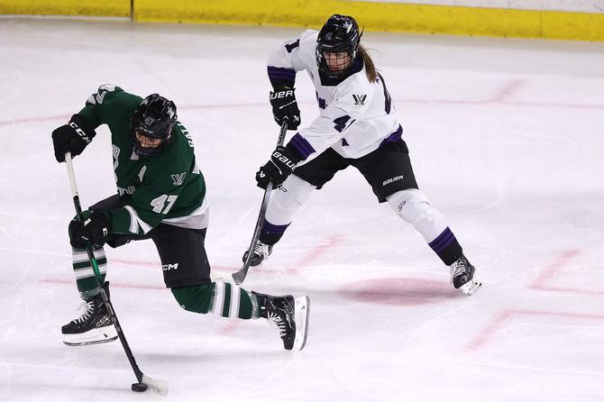 Jamie Lee Rattray #47 of Boston takes a shot past Denisa Křížová #41 of Minnesota
