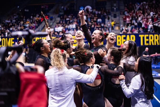 The unseeded Stanford women’s gymnastics team celebrates after their April 7th Regional upset that sent them to the national semifinals.