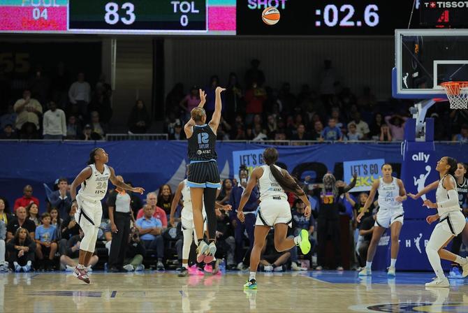 Chicago Sky rookie Sydney Taylor shoots the game-winning three.