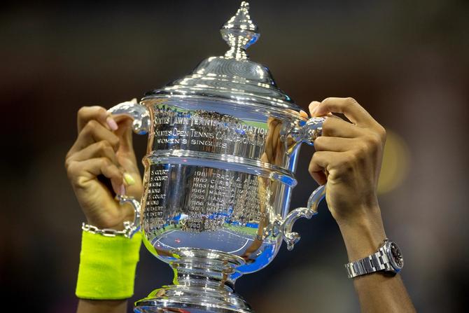 The hands of Coco Gauff of the United States with the winners trophy after her victory against Aryna Sabalenka of Belarus in the Women's Singles Final.