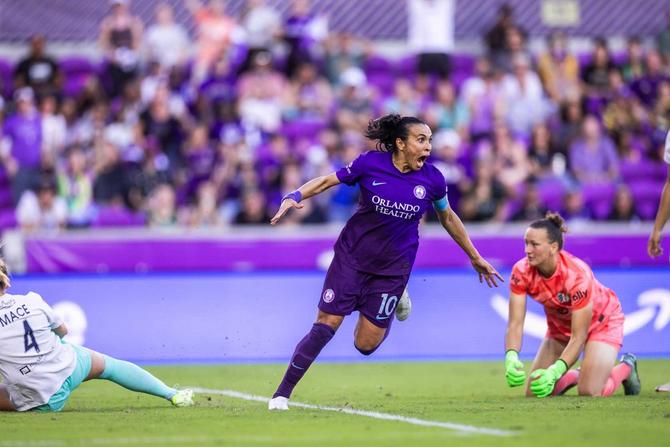 Orlando Pride star Marta celebrates after scoring a goal.