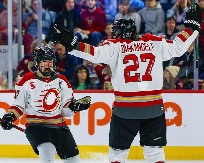The Ottawa Charge’s Shiann Darkangelo celebrates her goal with her teammate, Jocelyne Larocque.