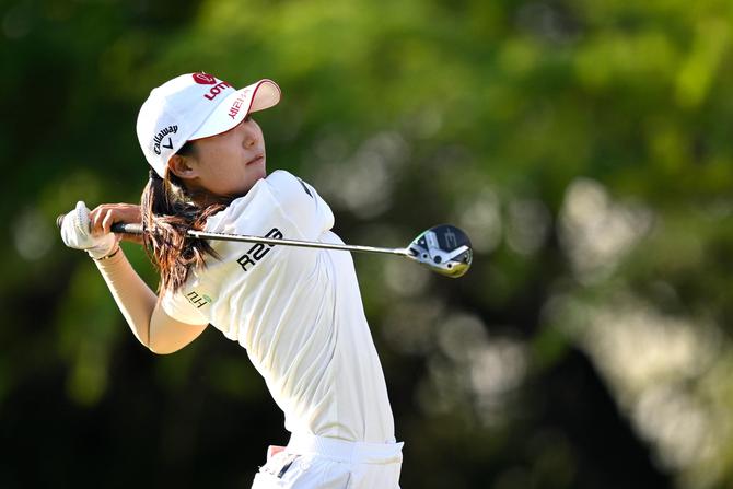 Youmin Hwang of South Korea plays her shot from the 14th tee during the second round of the LOTTE Championship