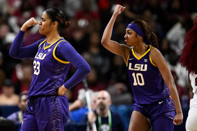 Aalyah Del Rosario #23 of the LSU Lady Tigers celebrates with Angel Reese #10 of the LSU Lady Tigers after a basket and foul against the South Carolina Gamecocks in the third quarter during the championship game of the SEC Women's Basketball Tournament at Bon Secours Wellness Arena on March 10, 2024 in Greenville, South Carolina.