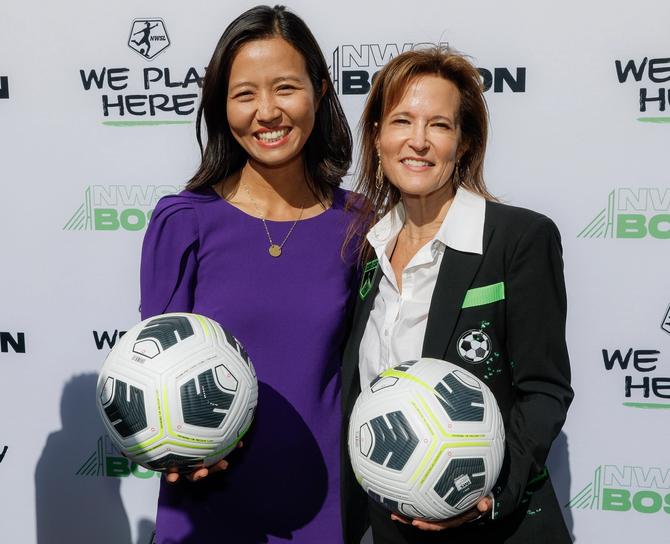 Boston Mayor Michelle Wu poses for a photo with Jennifer Epstein, controlling partner of Boston Unity Soccer Partners, during a press conference announcing that a Boston team will join the league.