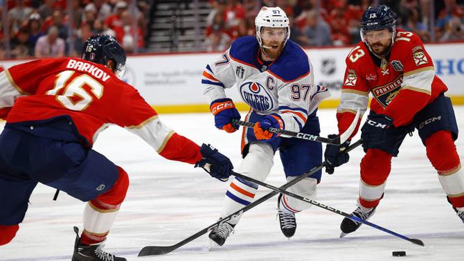 Edmonton Oilers captain Connor McDavid fights for the puck against the Florida Panthers.