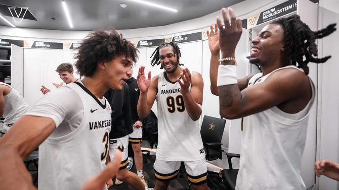 The Vanderbilt men’s basketball team celebrates its win over No. 9 Kentucky