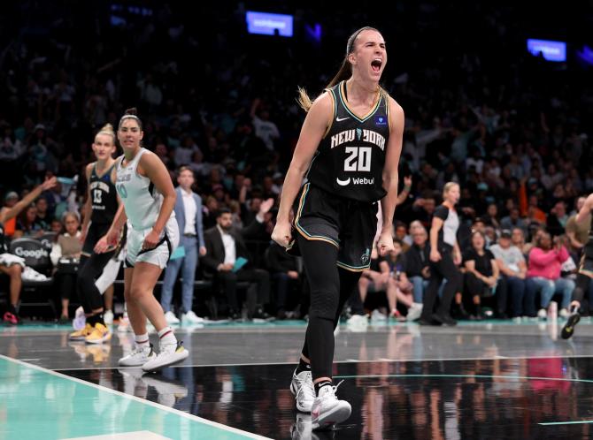 Sabrina Ionescu #20 of the New York Liberty celebrates a turnover in the first half of Game 2 of the WNBA semifinals. 