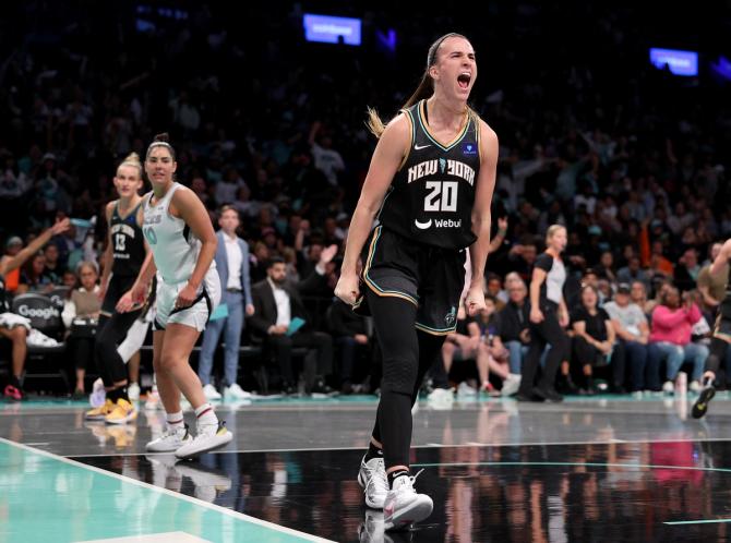 Sabrina Ionescu #20 of the New York Liberty celebrates a turnover in the first half of Game 2 of the WNBA semifinals.