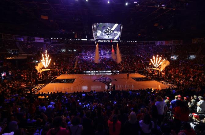 Pyrotechnics shoot in the air as the Las Vegas Aces are introduced before a game against the Connecticut Sun at Michelob ULTRA Arena on June 21, 2024 in Las Vegas, Nevada. The Aces became the first-ever WNBA team to sell out all of their regular season home games. The Aces defeated the Sun 85-74.