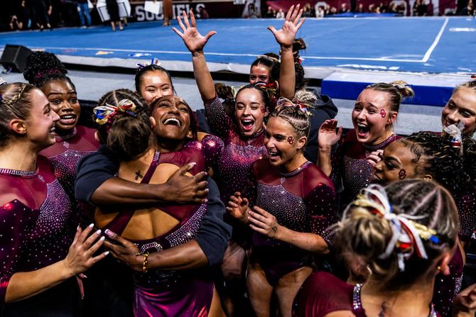 The No. 1–seed Oklahoma women’s gymnastics team celebrates after their record-breaking Big 12 Championships win on March 23rd.